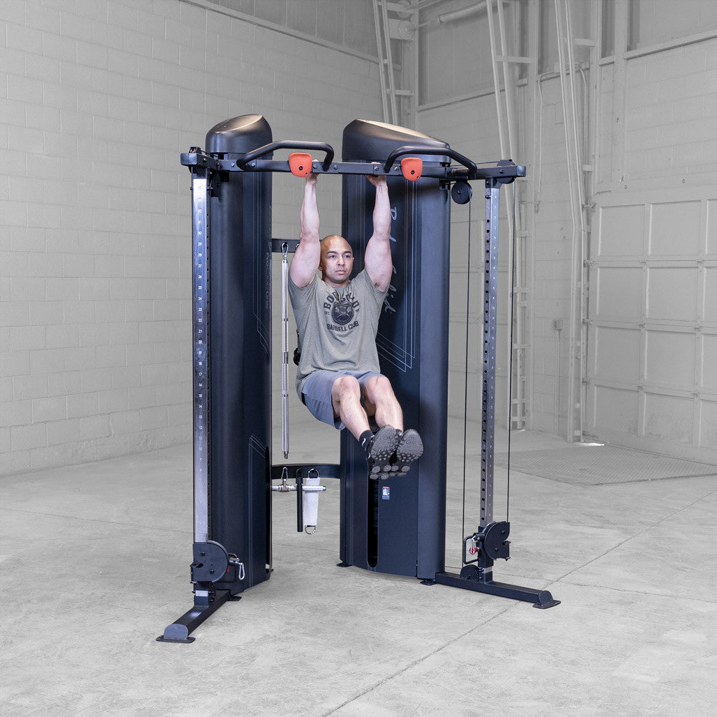 Body-Solid S2FTX functional trainer, close view of the selector pin and weight stack plates