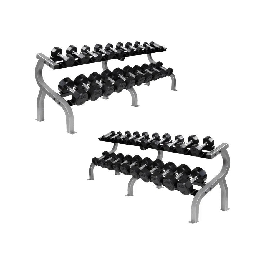 The Troy 5-100 lb Rubber Commercial Dumbbell Set by TROY Barbell features gym-quality equipment with two racks of black rubber dumbbells, organized in pairs by increasing weight. Sturdy metal shelves on the racks and a minimalist white background showcase its professional appeal.