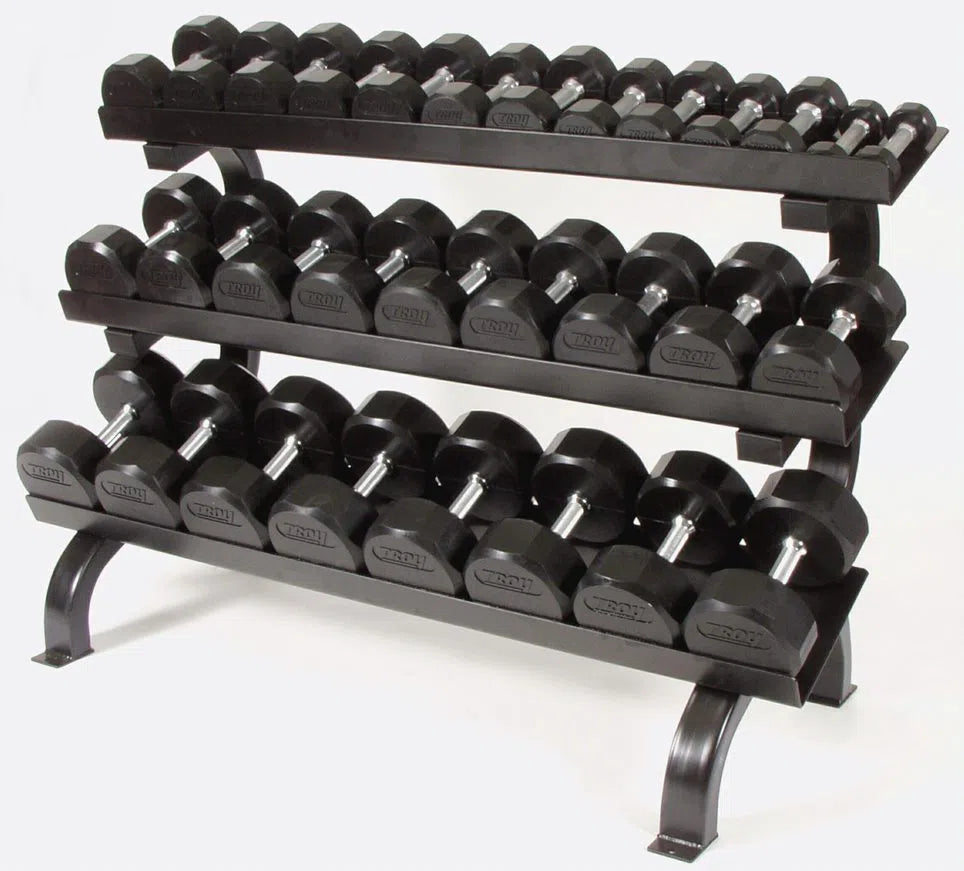 The TROY Barbell 5-75 lb Rubber Commercial Dumbbell Set w/ Rack features a three-tiered black metal rack that organizes varying weights from lightest at the top to heaviest at the bottom, ideal for versatile strength training against a plain background.