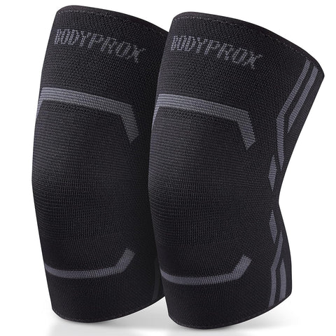 A pair of black Bodyprox knee compression sleeves.