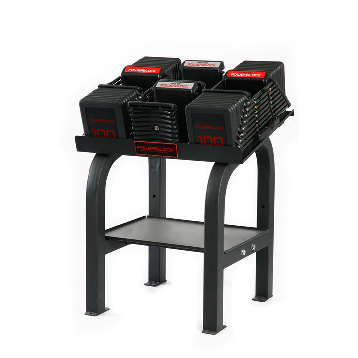 PowerBlock Commercial Pro 100 adjustable dumbbell pair loaded on the Pro Rack stand with the 5 lb knurled handles in place