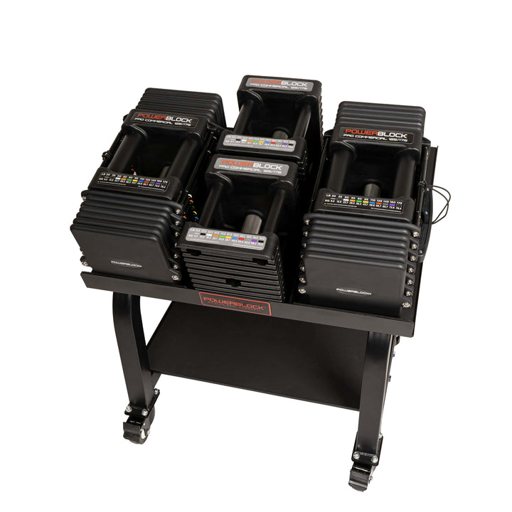 PowerBlock Commercial Pro 125 adjustable dumbbell, showing the black urethane coated weight plates and the selector pin