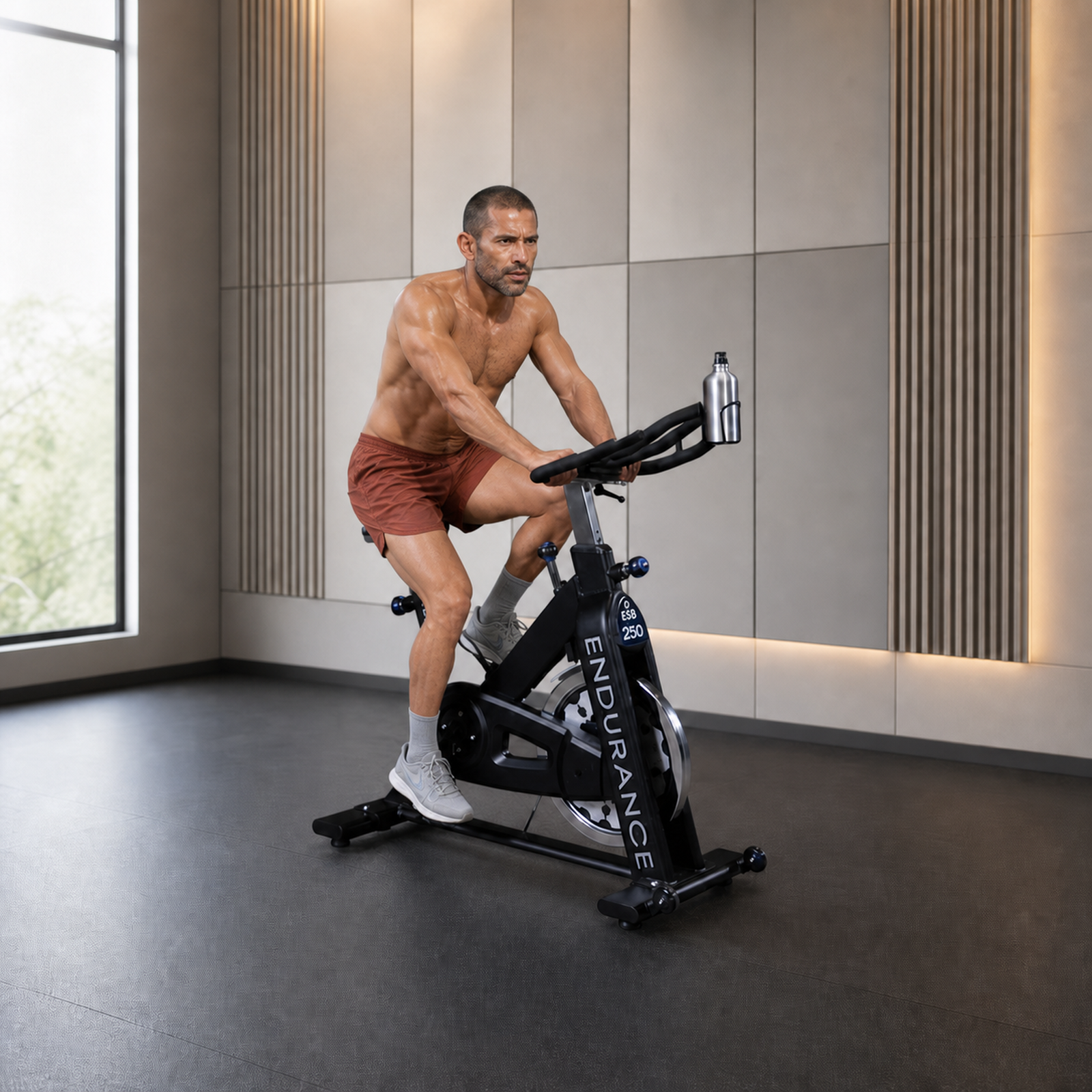 Body-Solid Endurance ESB250 indoor cycle with athlete riding in a premium studio