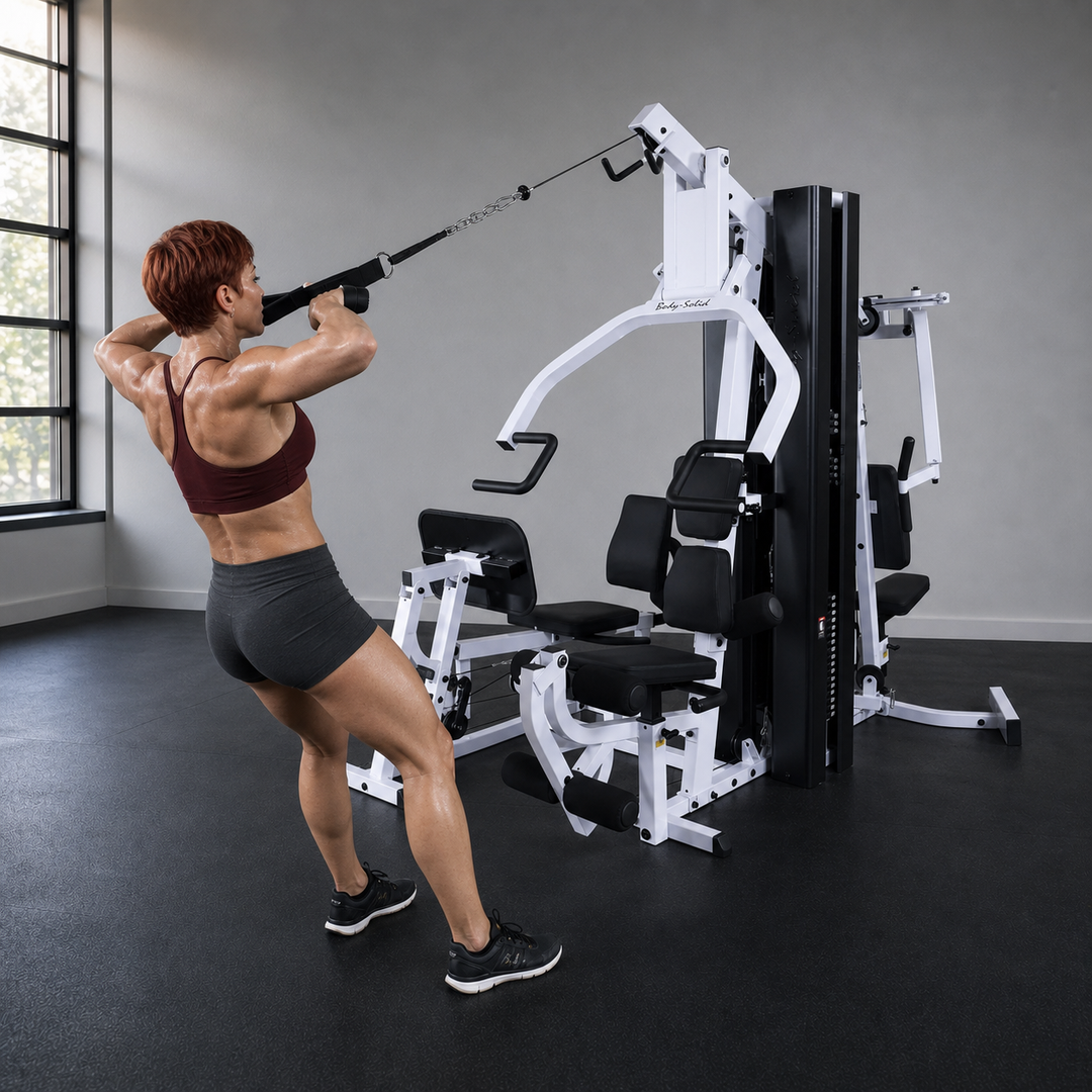 Fit model performing a high face pull on the Body-Solid EXM3000LPS high pulley