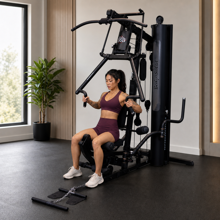 Fit model performing a chest press on the Body-Solid G6B Bi-Angular press arm