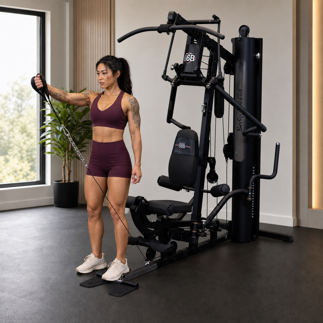 Fit model performing a one-arm cable lateral raise on the Body-Solid G6B low pulley