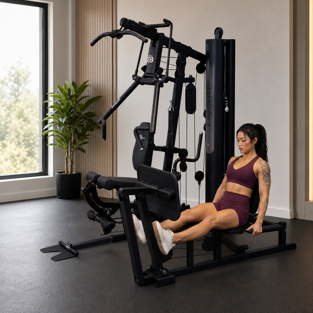 Fit model using the optional GLPB leg press attachment on the Body-Solid G6B