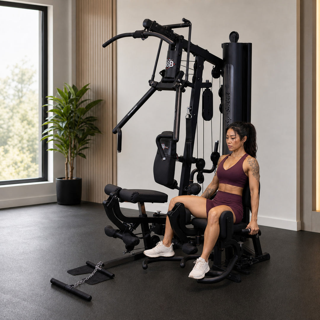 Fit model using the optional inner and outer thigh attachment on the Body-Solid G6B
