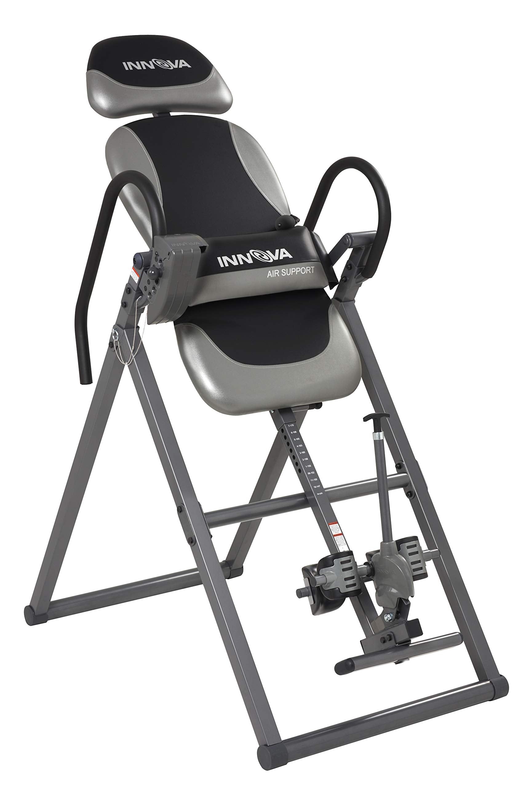 An inversion table with a padded backrest, ankle supports, and sturdy metal frame, designed for back therapy and stretching exercises.