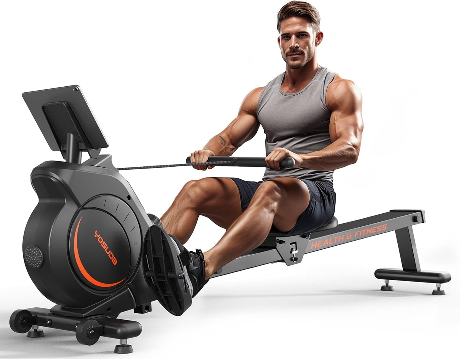 A muscular man in a sleeveless shirt and shorts uses a rowing machine for exercise, pulling the handle while seated, with a monitor screen in front of him.