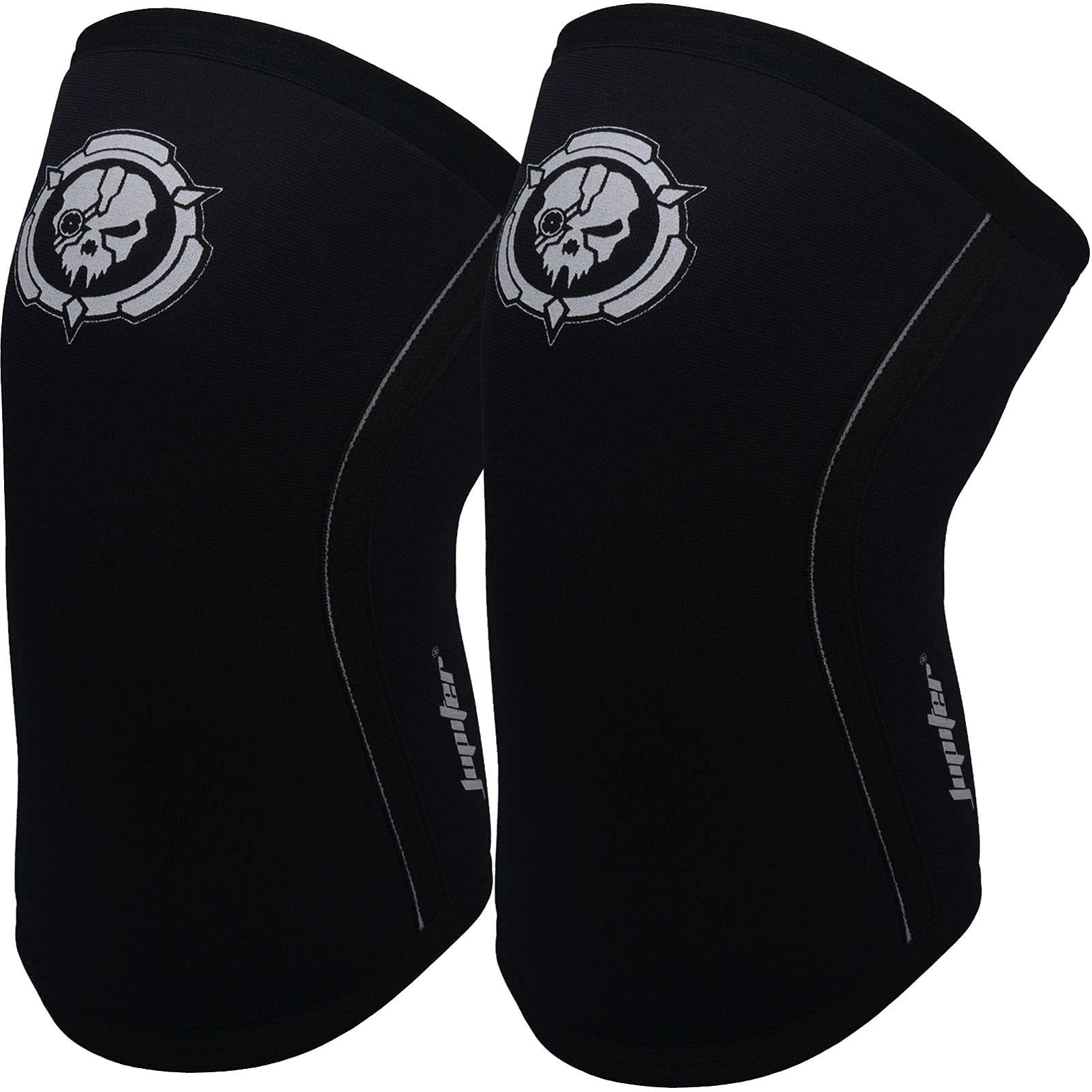 A pair of black knee sleeves featuring a white skull emblem on each, with curved white stitching along the sides and Bear KompleX branding near the bottom edge.