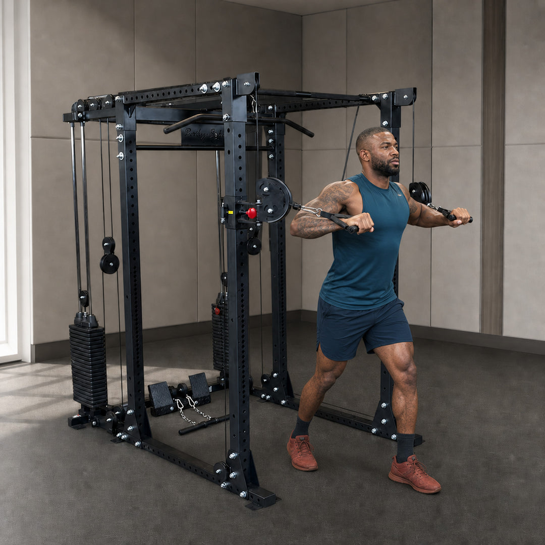 Body-Solid GPR400 power rack with GPRFTS cable crossover and athlete training in a premium studio