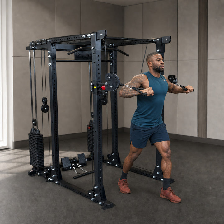 Body-Solid GPR400 power rack with GPRFTS cable crossover and athlete training in a premium studio