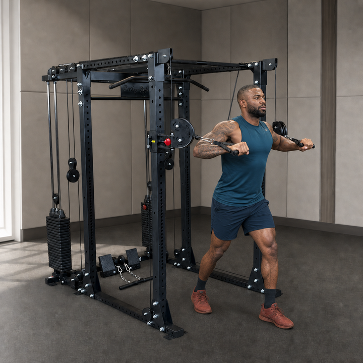 Body-Solid GPR400 power rack with GPRFTS cable crossover and athlete training in a premium studio