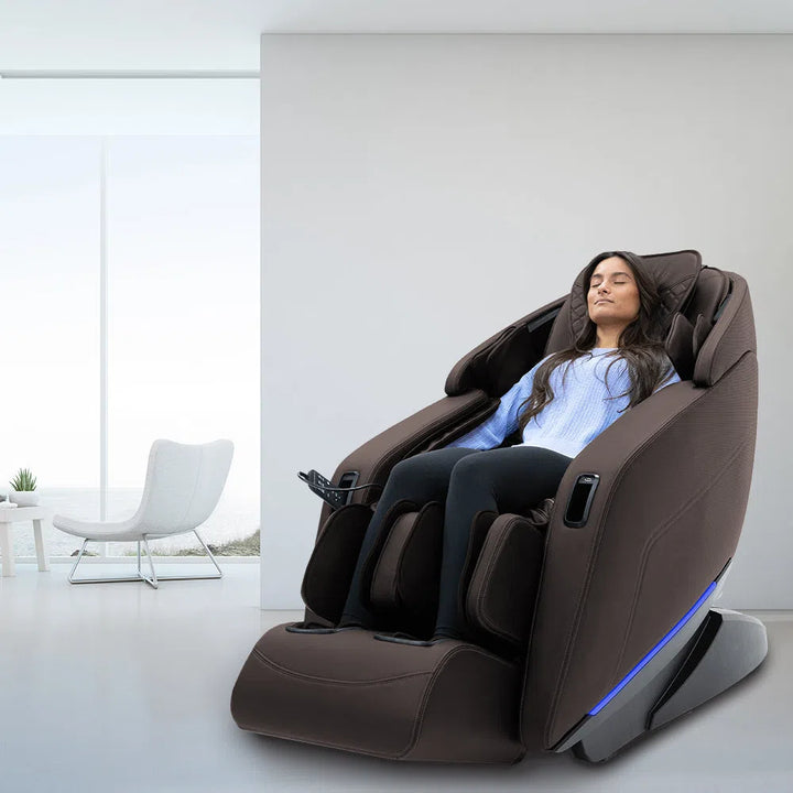 lady-sitting-in-Sharper-Image-Axis-4D-Full-Body-Massage-Chair-in-Brown
