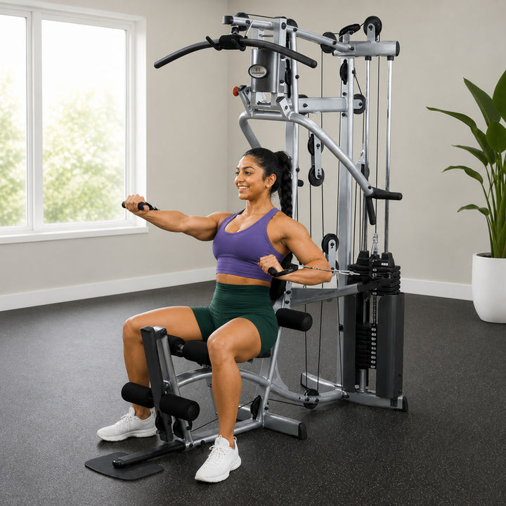 Fit model performing a seated chest press on the Powerline P2X multi-press arm