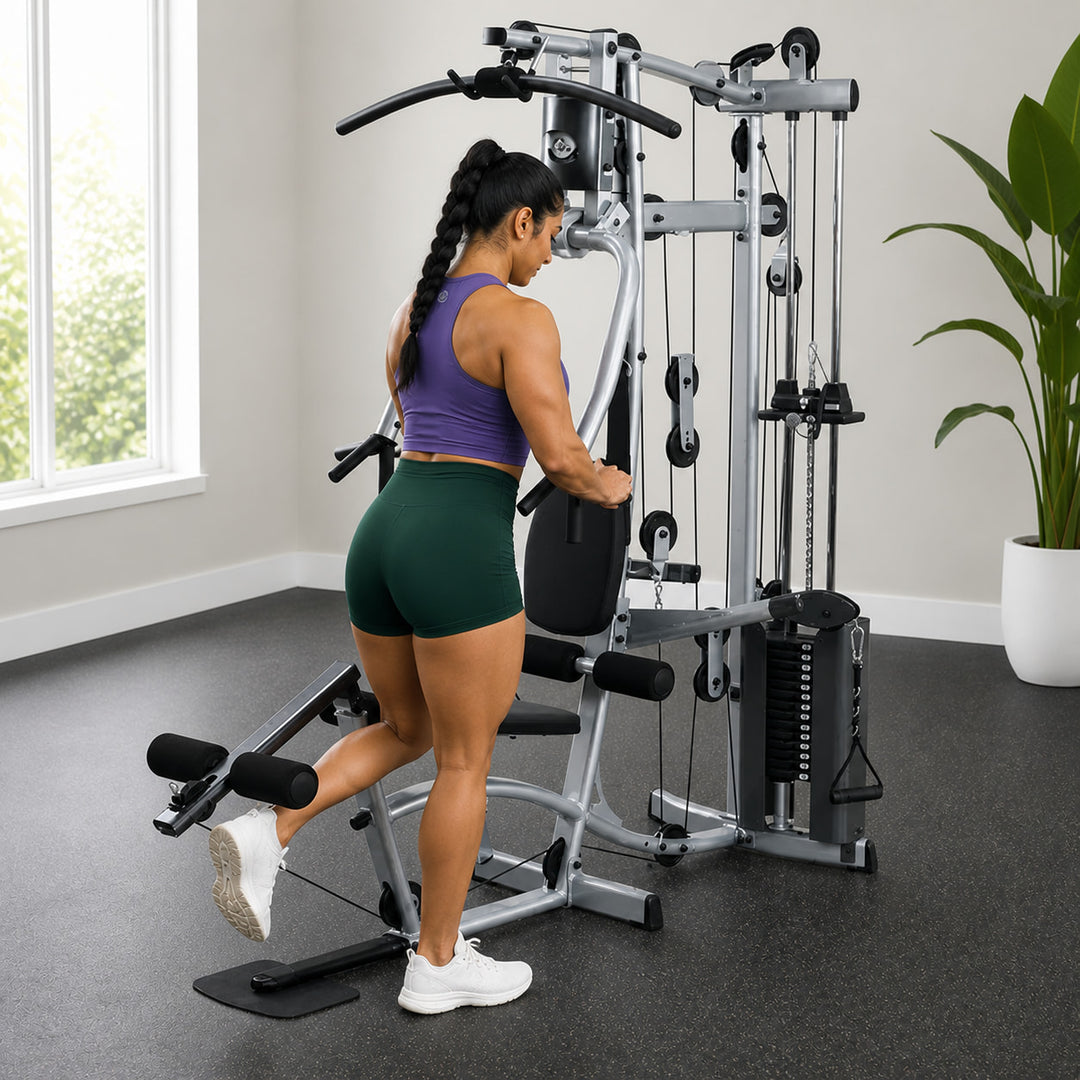 Fit model performing a standing leg curl on the Powerline P2X leg developer