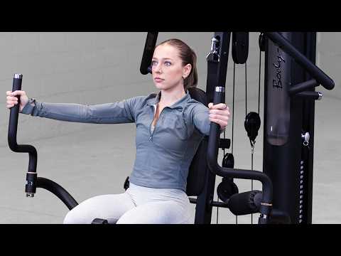 Body-Solid G6B Bi-Angular Multi-Station Gym product video showing the press arm, Perfect Pec station, pulleys and leg developer in use