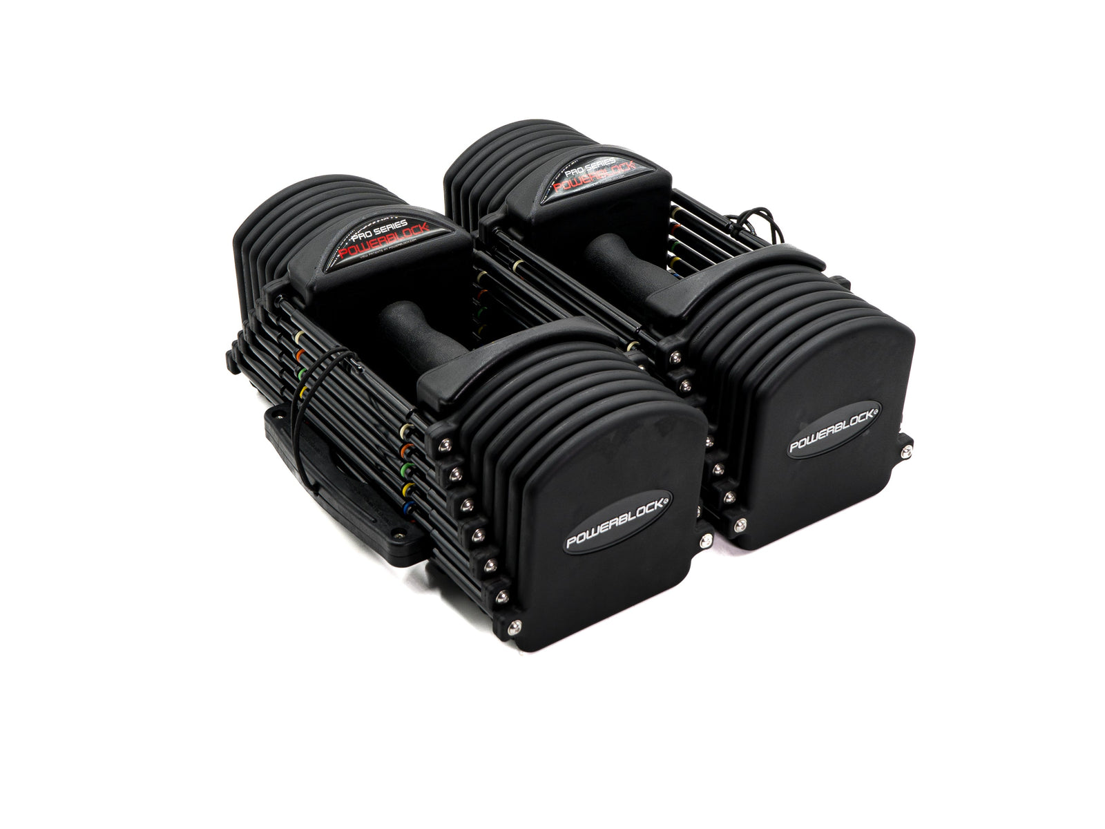 PowerBlock Commercial Pro 32 adjustable dumbbells shown as a pair, black urethane plates with contoured TPR handles