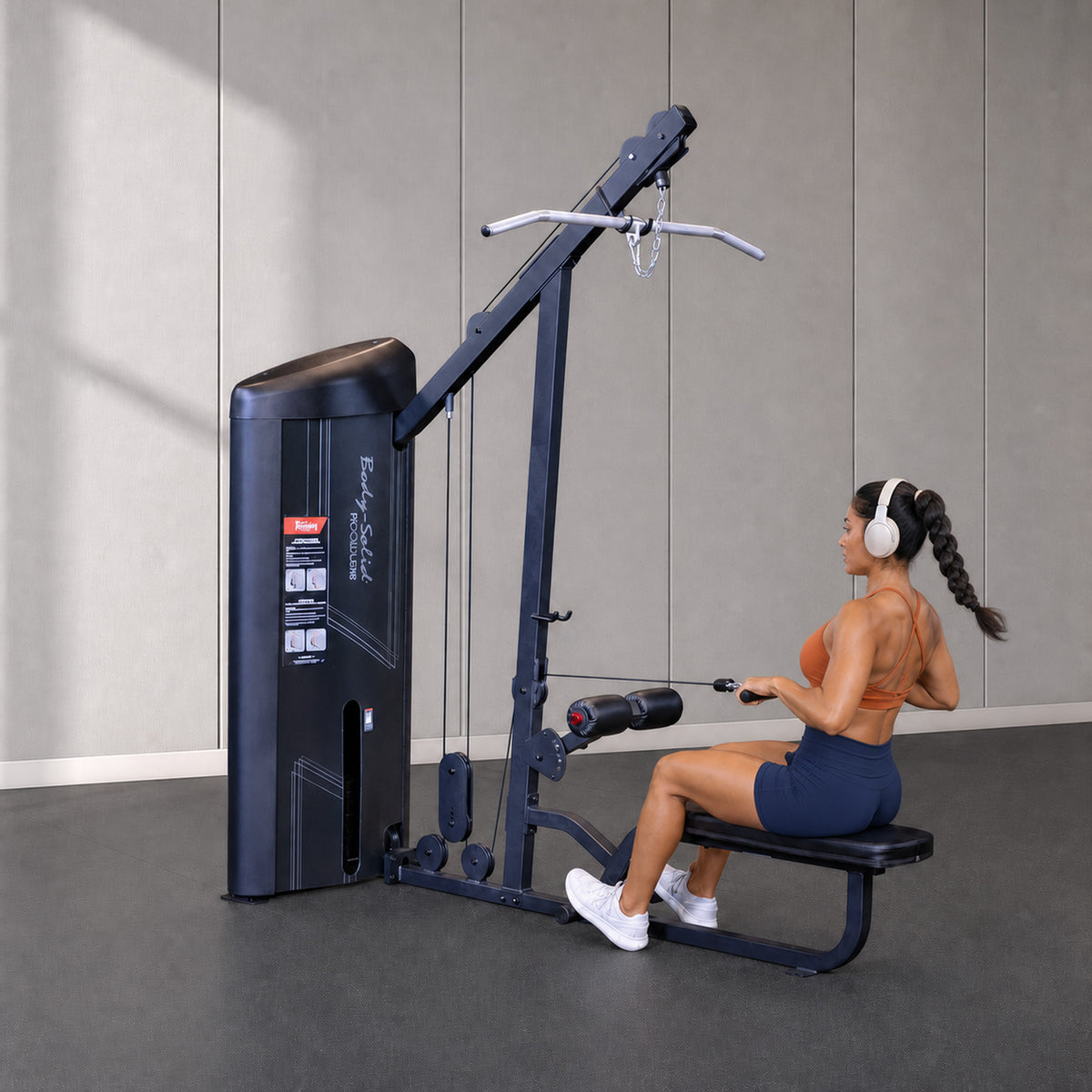 Body-Solid Pro ClubLine S2LATX seated mid-row exercise in a premium commercial studio
