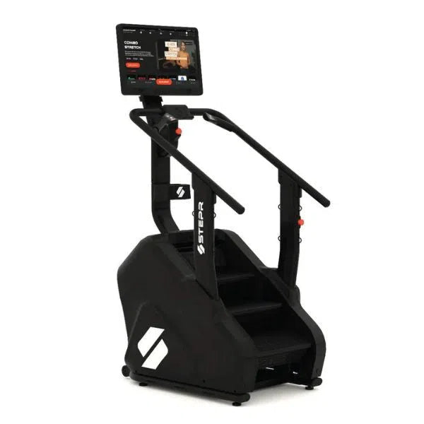 The STEPR PRO+ Commercial Stair Climber by STEPR is a black fitness machine with handrails and an HD touchscreen that displays workout information as you climb.