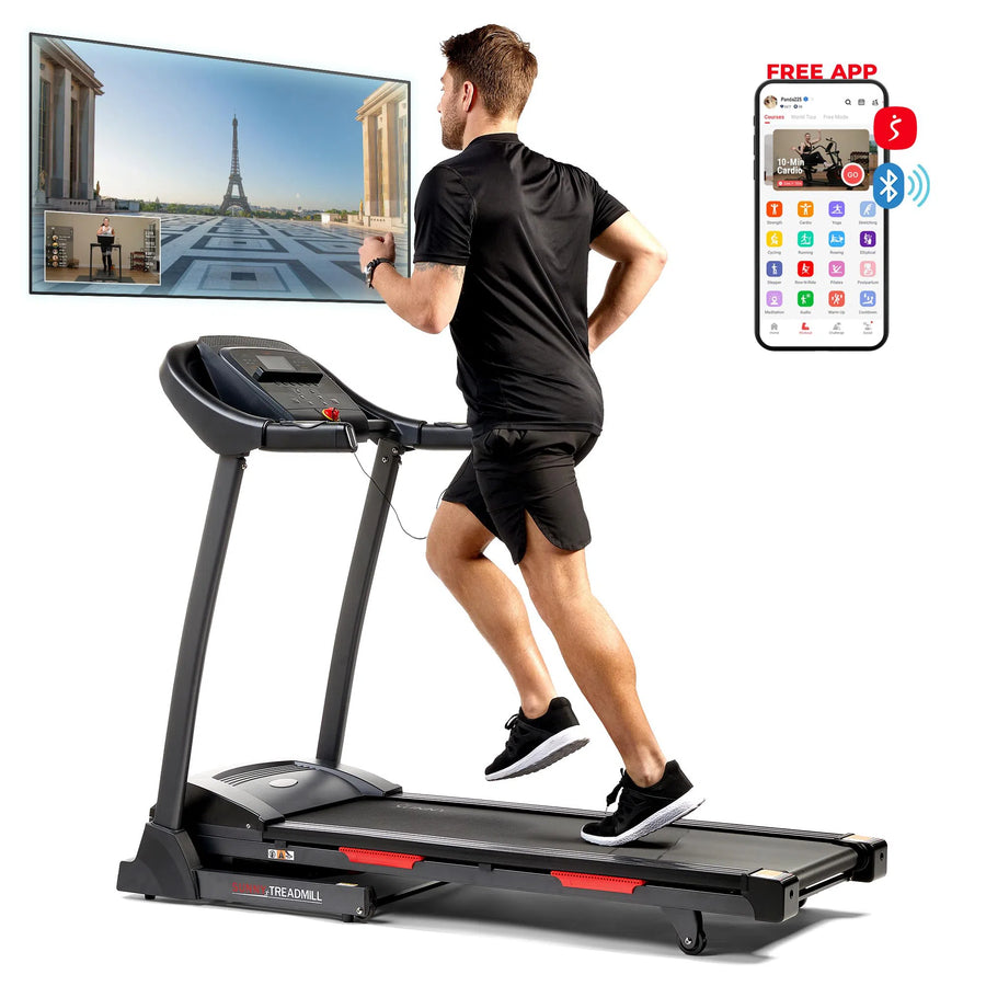 Running on the Sunny Health & Fitness Premium Folding Treadmill in a room with a virtual Paris and the Eiffel Tower on screen, they wear black shorts and shirt. They connect seamlessly through the FREE APP mobile app.